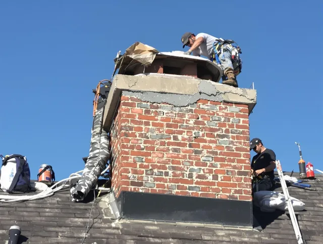 Montebello Chimney Sweep installing a custom chimney crown in Montebello, CA